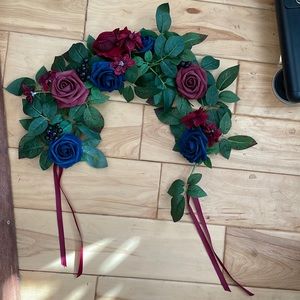 6 Ling’s Moments burgundy and navy centerpieces with ribbon ties